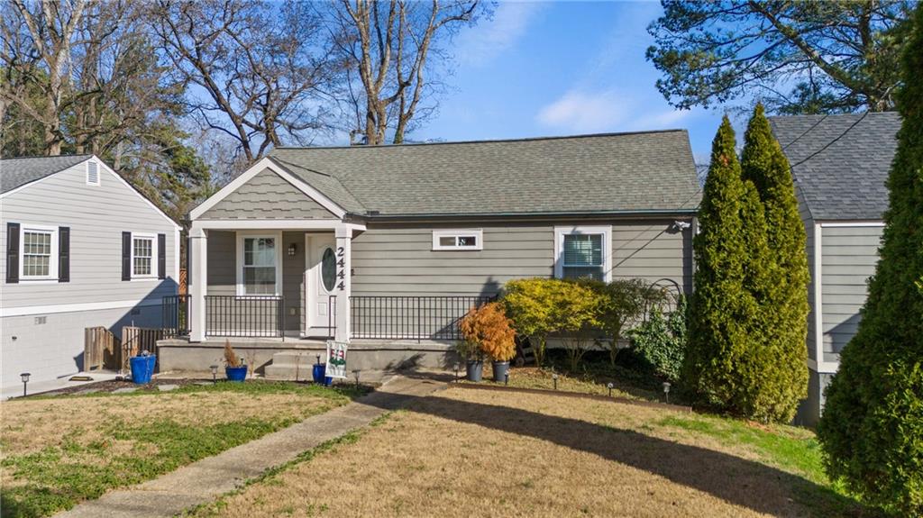 2444 Constance Street Atlanta, GA 30344 - Photo 3 of 39 front view of a house with potted plants