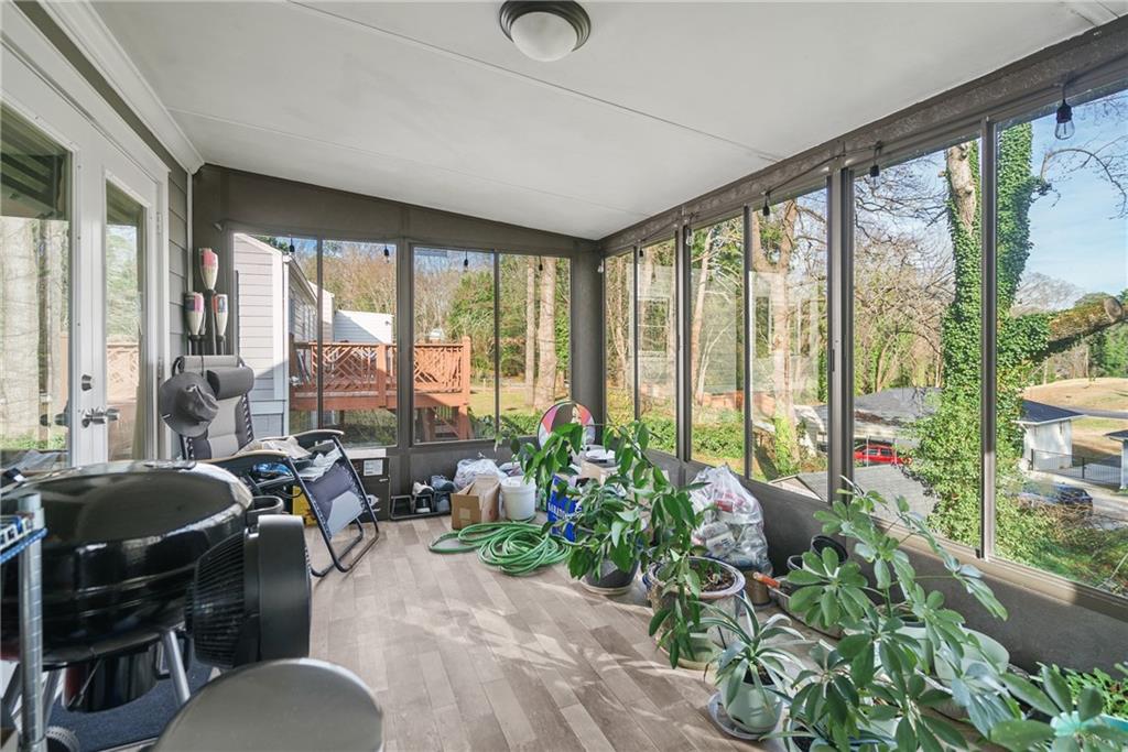 2444 Constance Street Atlanta, GA 30344 - Photo 34 of 39 a living room filled with furniture and a potted plant