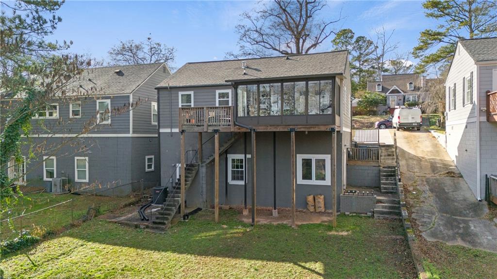 2444 Constance Street Atlanta, GA 30344 - Photo 36 of 39 a front view of a house with garden