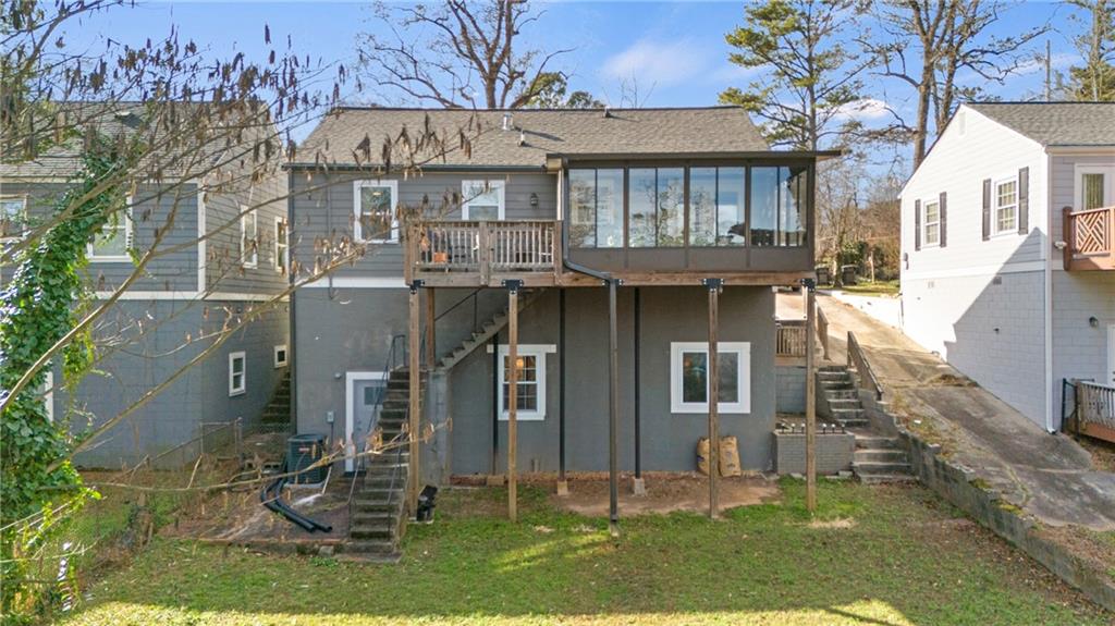 2444 Constance Street Atlanta, GA 30344 - Photo 37 of 39 front view of a house with a yard