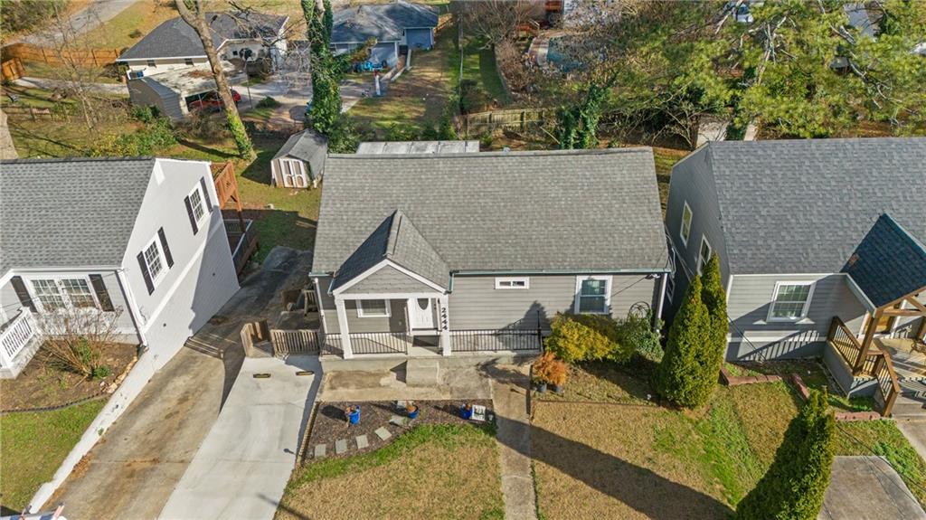 2444 Constance Street Atlanta, GA 30344 - Photo 5 of 39 an aerial view of a house with swimming pool and outdoor seating
