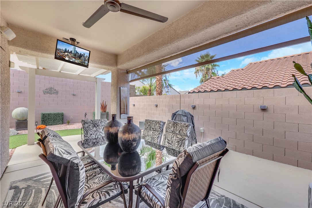 2635 Dirleton Place Henderson, NV 89044 - Photo 41 of 50 A covered patio overlooking a privately enclosed yard with concrete flooring.