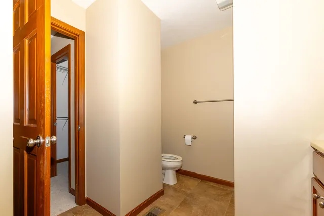 a view of staircase with white walls