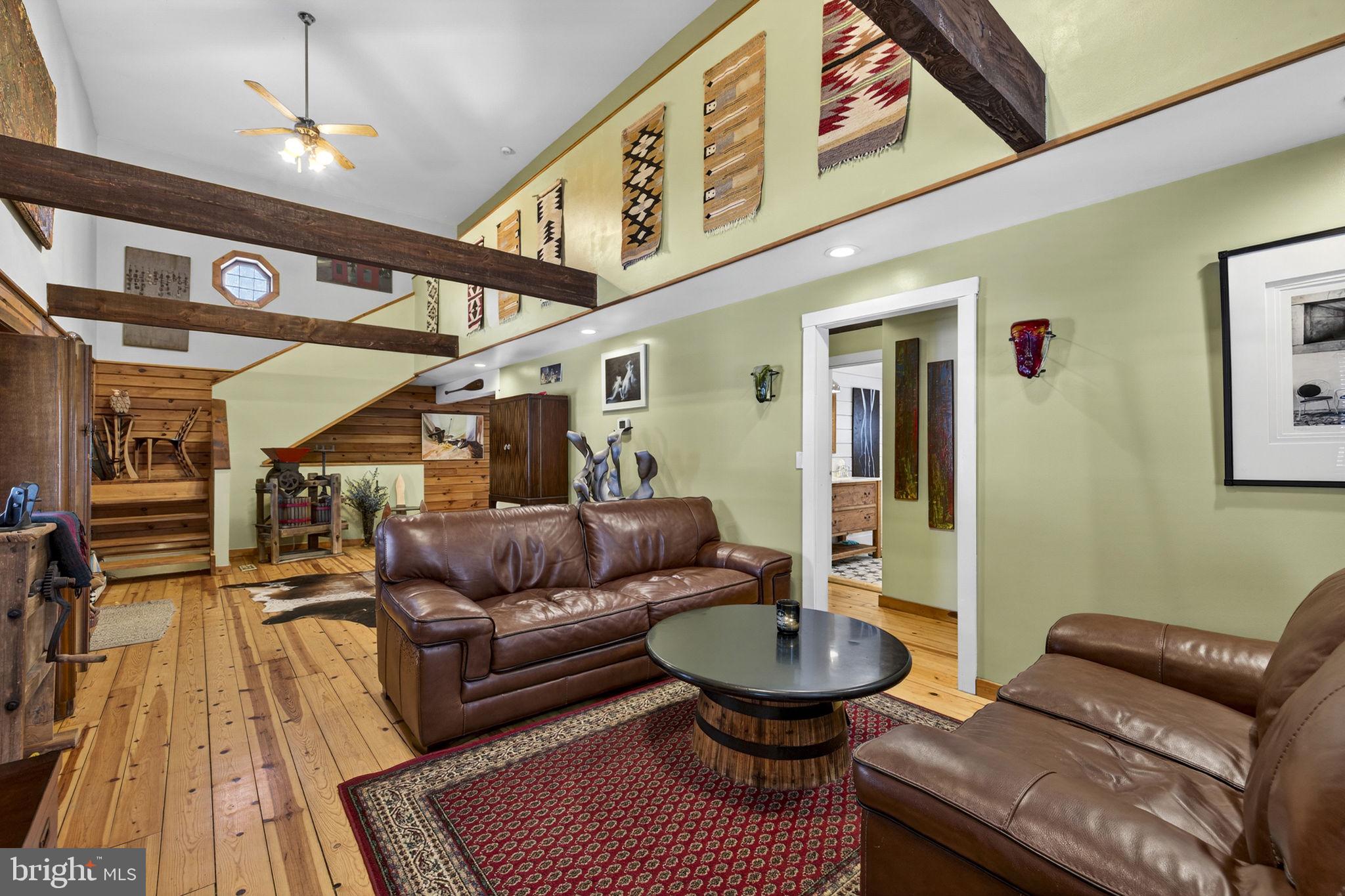 10418 Cliff Mills Road Marshall, VA 20115 - Photo 21 of 88 a living room with furniture and a rug