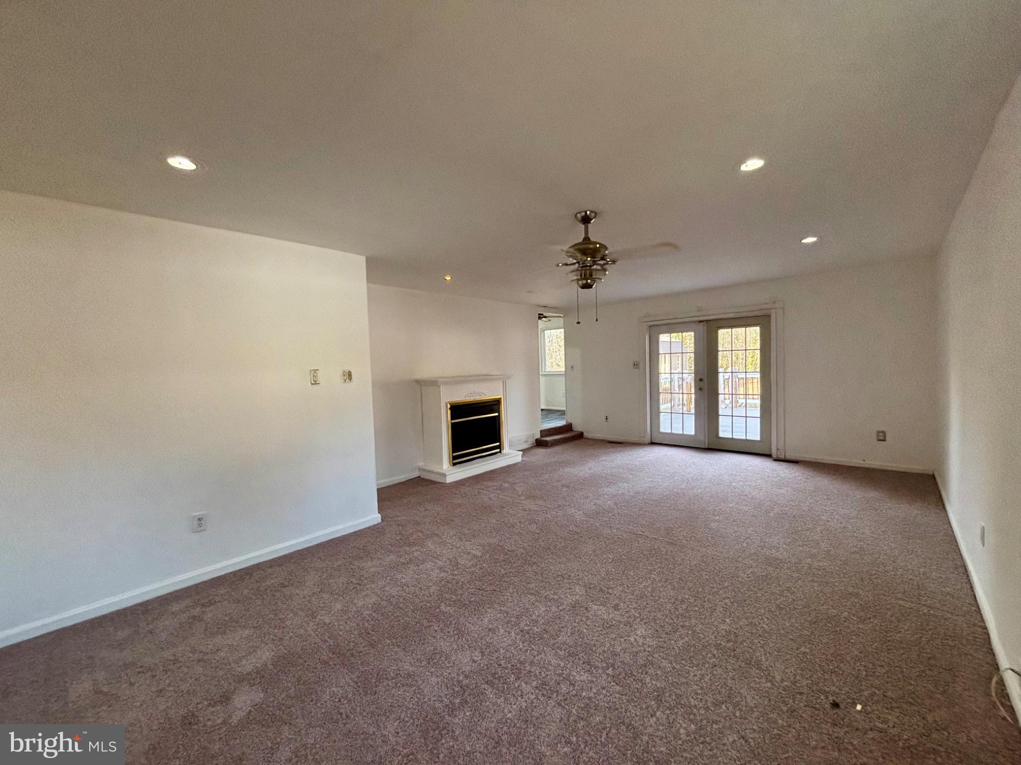 142 Oak Pines Boulevard Pemberton, NJ 08068 - Photo 14 of 17 a view of empty room with a fireplace