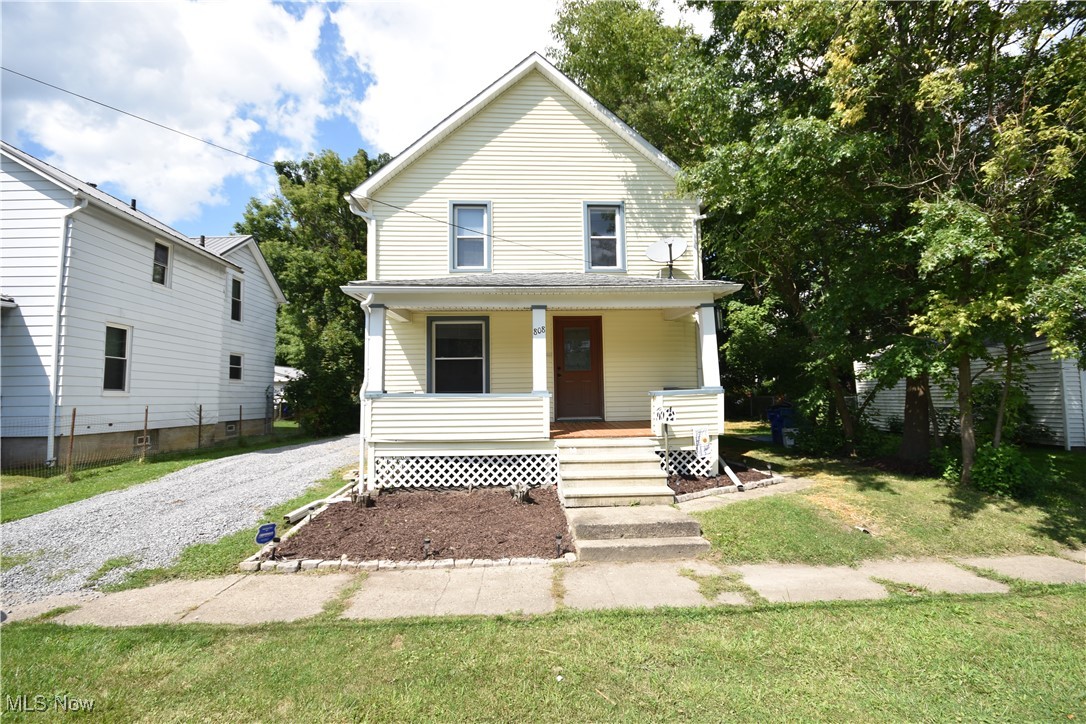 808 West Riddle Avenue Ravenna, OH 44266 - Photo 1 of 28 View of front facade featuring a porch