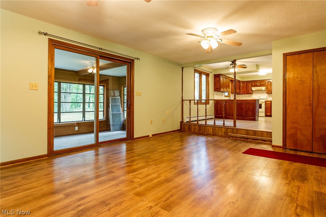 5248 Case Road North Ridgeville, OH 44039 - Photo 11 of 29 Family room with views of kitchen and enclosed patio