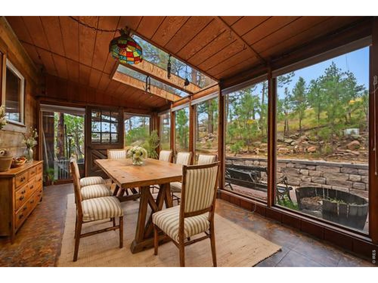 788 Pioneer Road Lyons, CO 80540 - Photo 19 of 50 Sunroom virtually staged