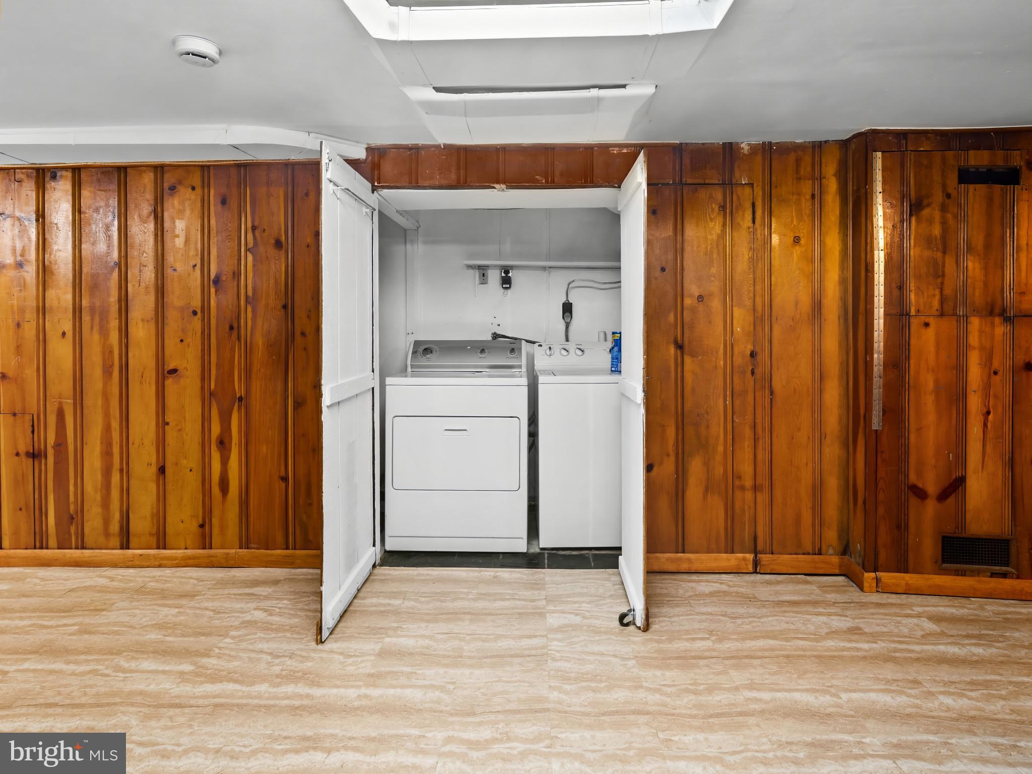 101 Upmanor Road Baltimore, MD 21229 - Photo 16 of 40 a view of a hallway with entryway wooden floor and cabinet