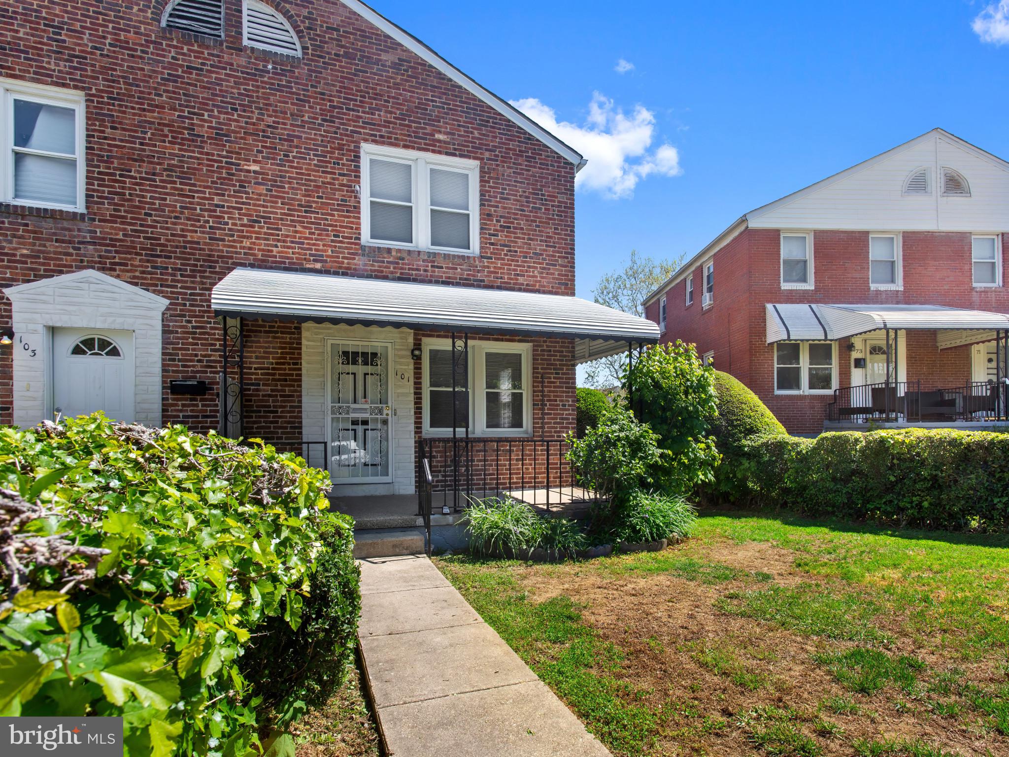 101 Upmanor Road Baltimore, MD 21229 - Photo 2 of 40 a front view of a house with garden
