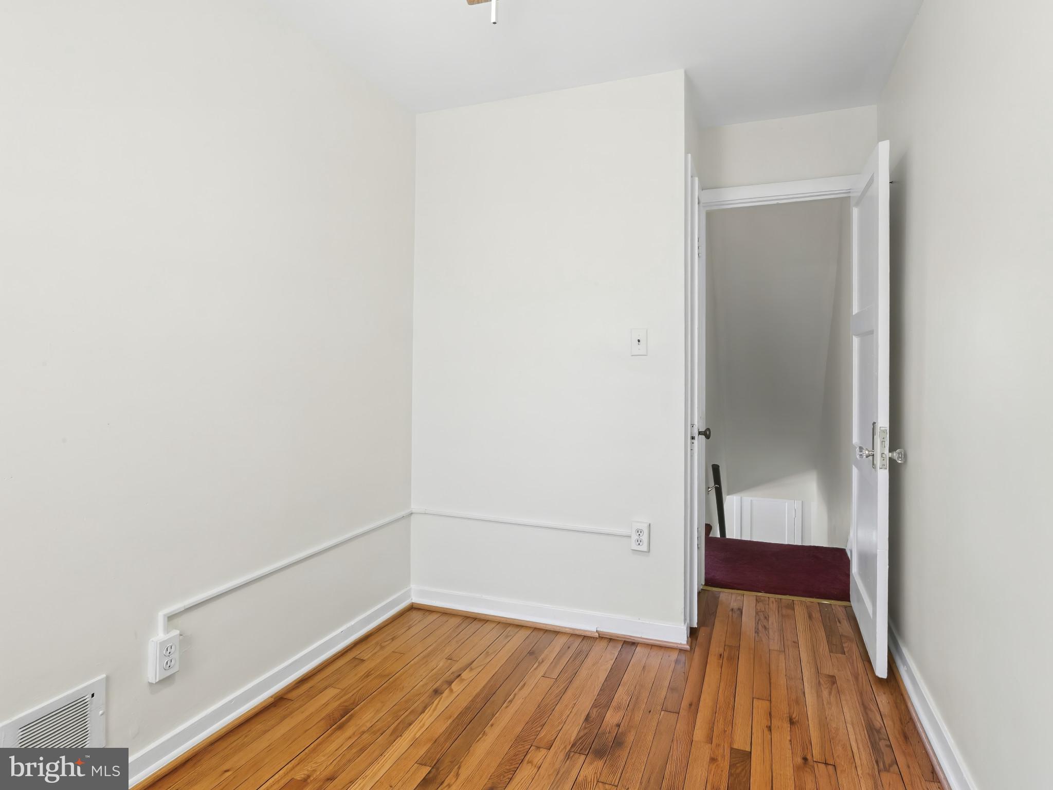 101 Upmanor Road Baltimore, MD 21229 - Photo 23 of 40 a view of a room with wooden floor