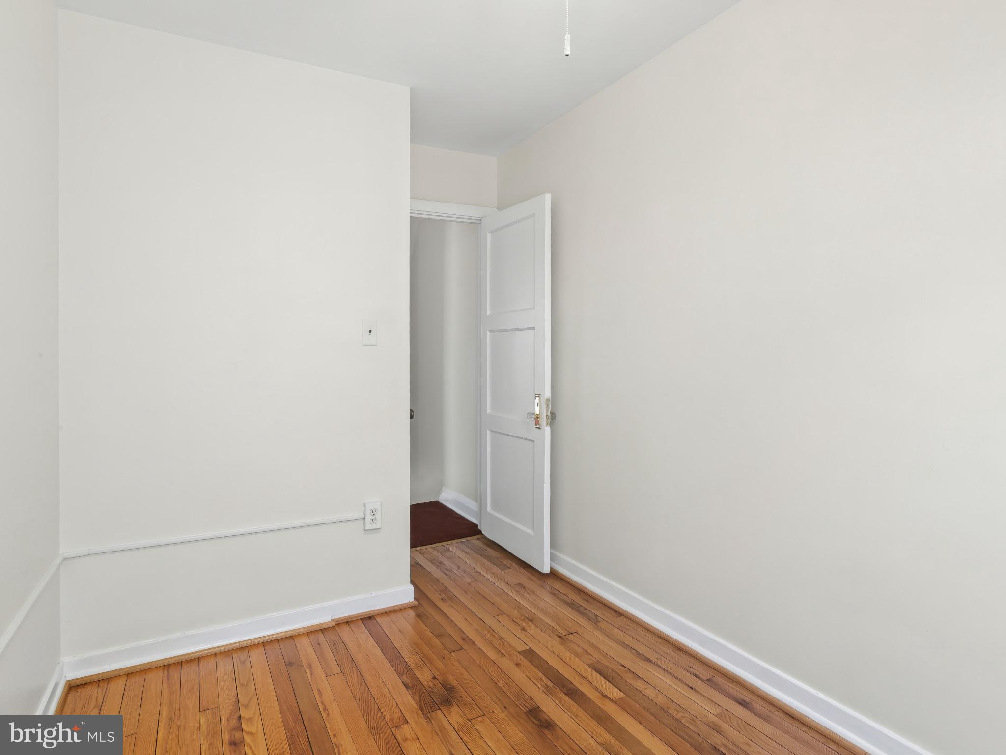 101 Upmanor Road Baltimore, MD 21229 - Photo 24 of 40 a view of a small space with wooden floor