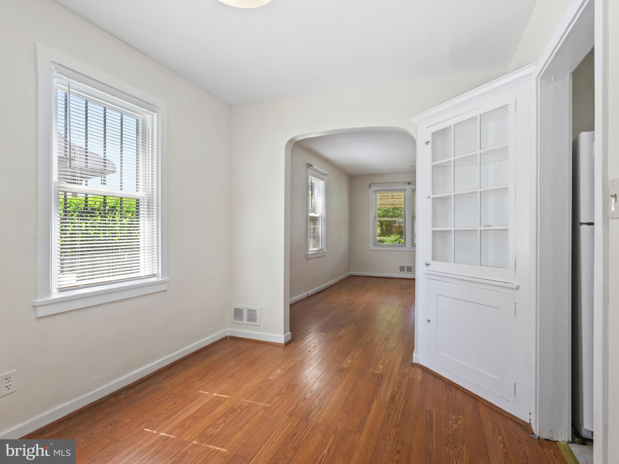 101 Upmanor Road Baltimore, MD 21229 - Photo 10 of 40 an empty room with windows and closet
