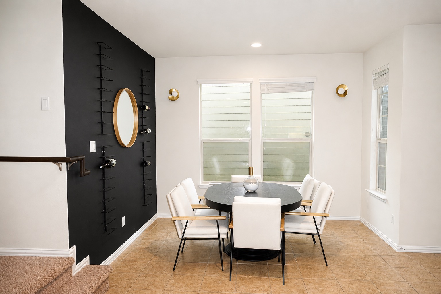 9929 Wading Pool Path Austin, TX 78748 - Photo 3 of 13 A refined dining space features tiled flooring and ample natural light through large windows.