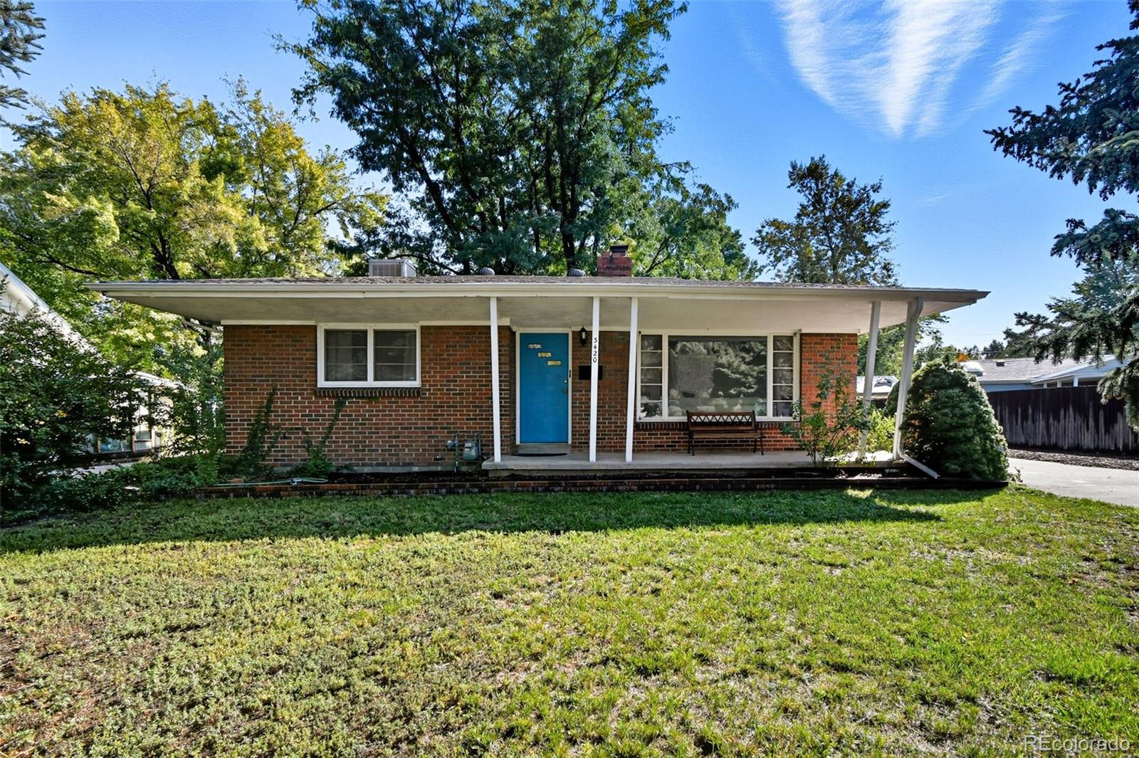 3420 Otis Street Wheat Ridge, CO 80033 - Photo 2 of 32 a view of a house with garden