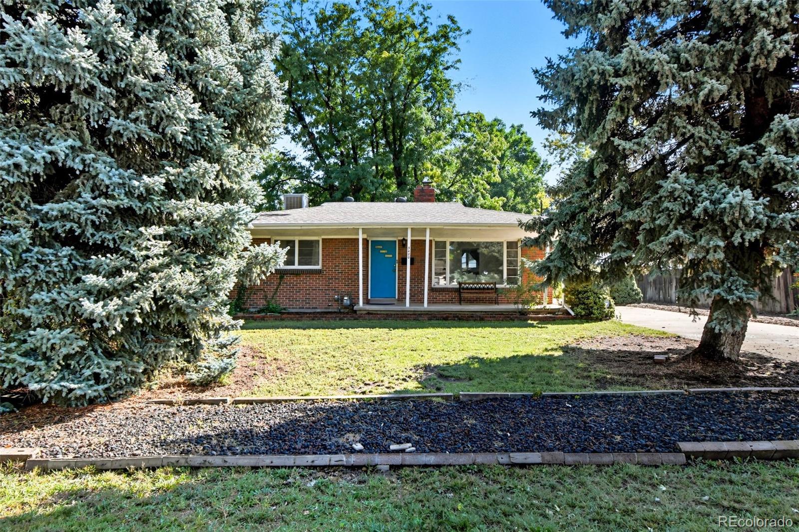 3420 Otis Street Wheat Ridge, CO 80033 - Photo 3 of 32 a view of a house with a yard