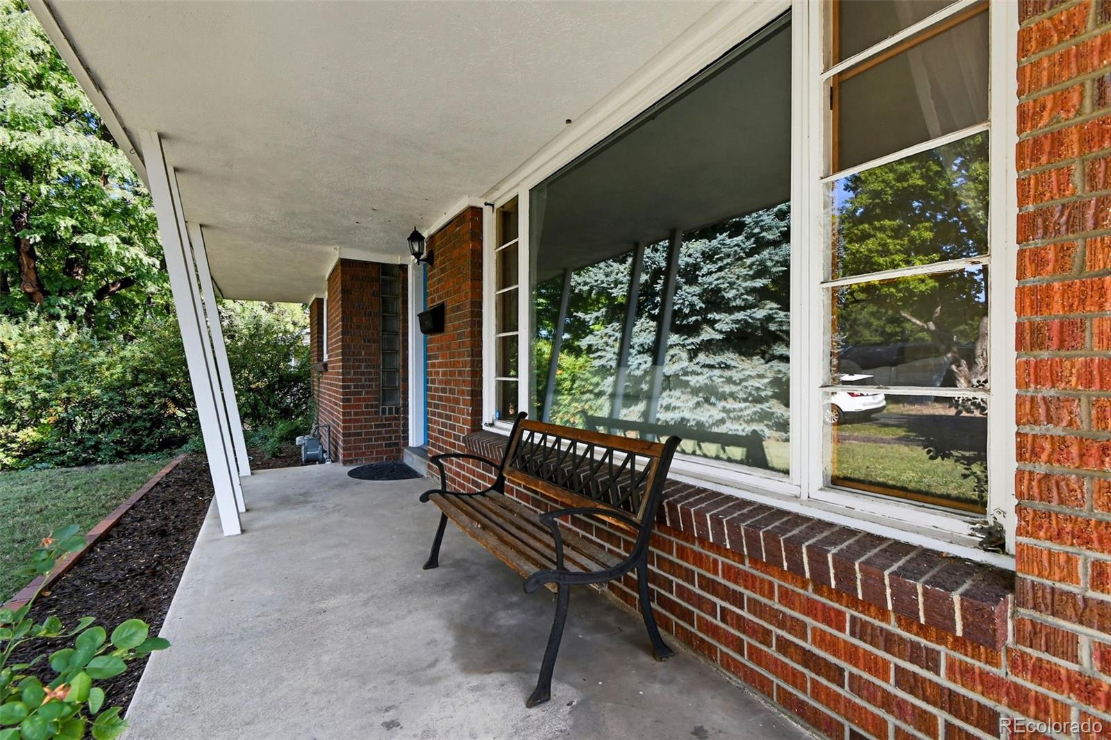 3420 Otis Street Wheat Ridge, CO 80033 - Photo 6 of 32 a view of a two chairs in the roof deck