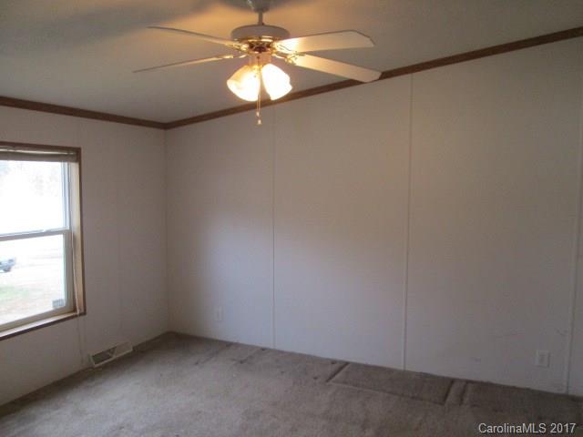 136 Asbury Road Canton, NC 28716 - Photo 12 of 24 an empty room with a window
