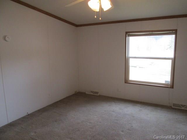 136 Asbury Road Canton, NC 28716 - Photo 13 of 24 an empty room with a window
