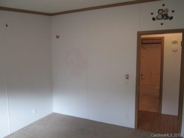 136 Asbury Road Canton, NC 28716 - Photo 17 of 24 a view of an empty room