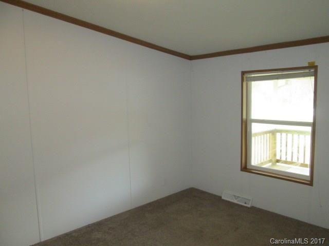 136 Asbury Road Canton, NC 28716 - Photo 19 of 24 an empty room with a window