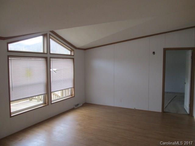 136 Asbury Road Canton, NC 28716 - Photo 10 of 24 an empty room with windows