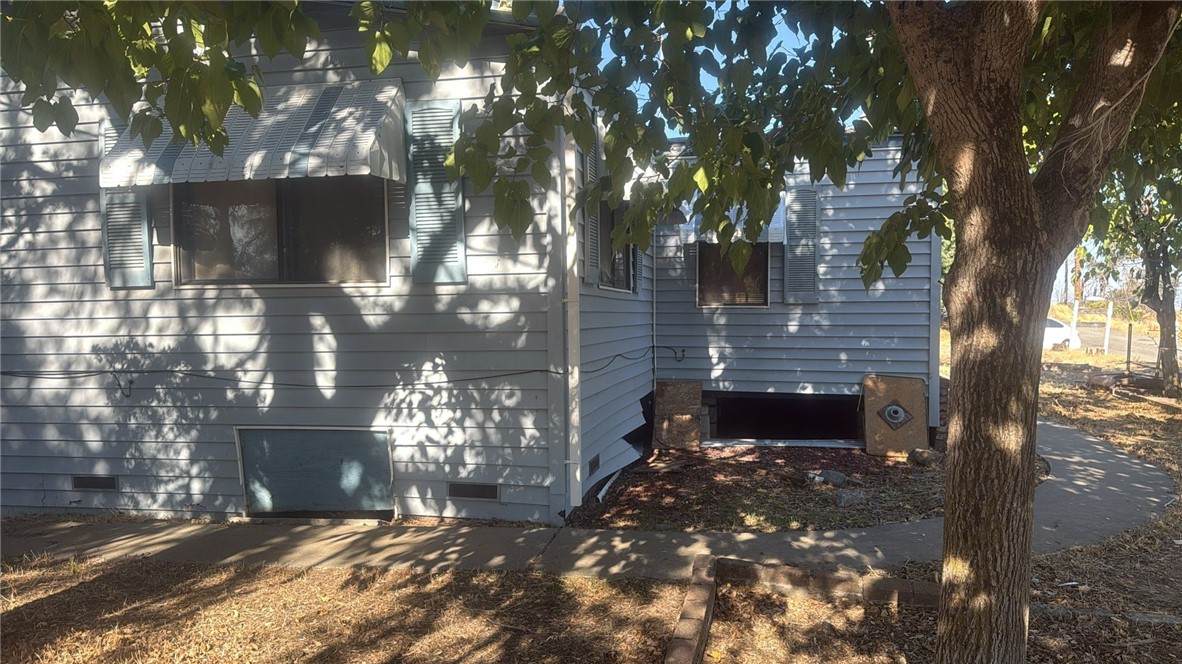 15702 Stagecoach Road Corning, CA 96021 - Photo 15 of 18 a front view of a house with a yard