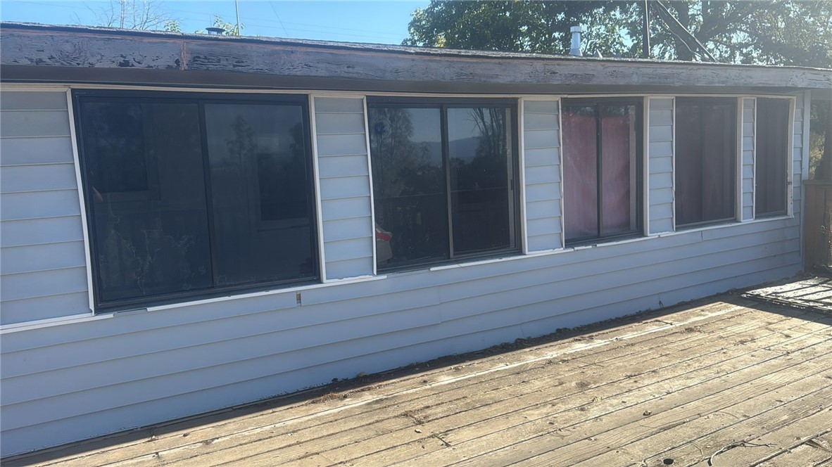 15702 Stagecoach Road Corning, CA 96021 - Photo 16 of 18 a wooden door in front of a house