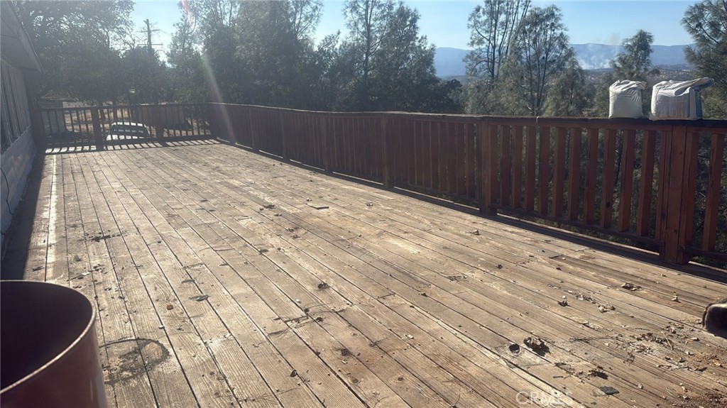 15702 Stagecoach Road Corning, CA 96021 - Photo 3 of 18 a view of balcony with wooden floor
