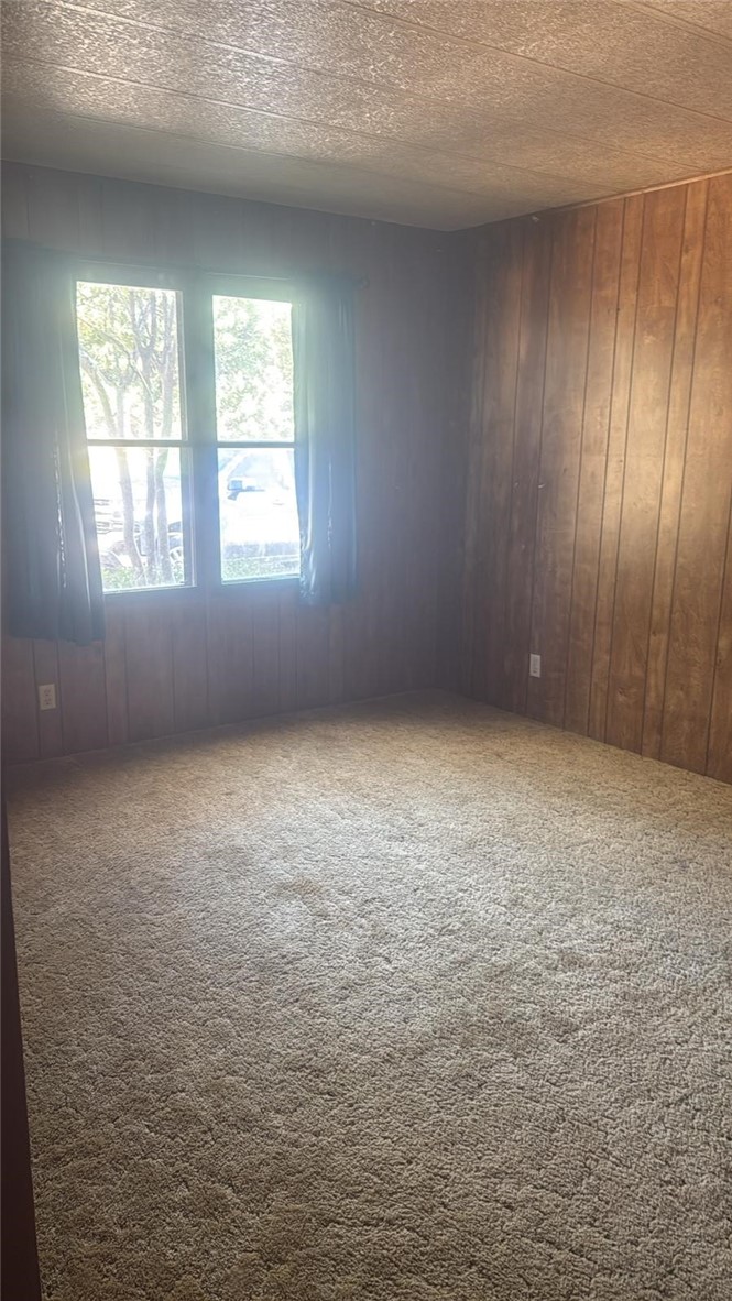 15702 Stagecoach Road Corning, CA 96021 - Photo 9 of 18 an empty room with windows