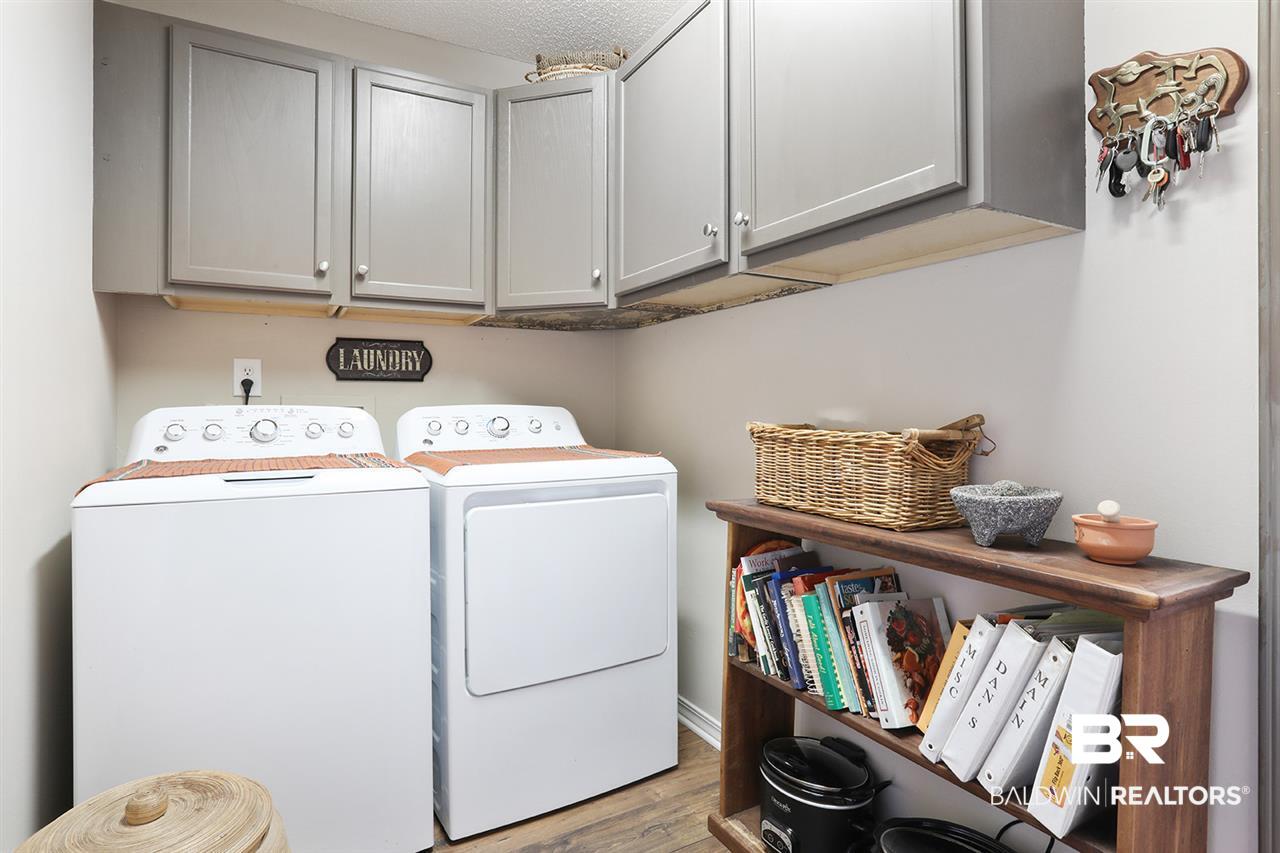 8969 Shoenight Circle Foley, AL 36535 - Photo 7 of 22 Laundry Room