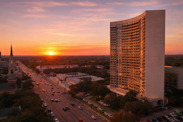 a view of a city with tall buildings
