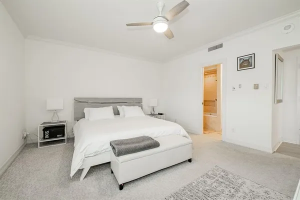 a bathroom with a shower sink and mirror