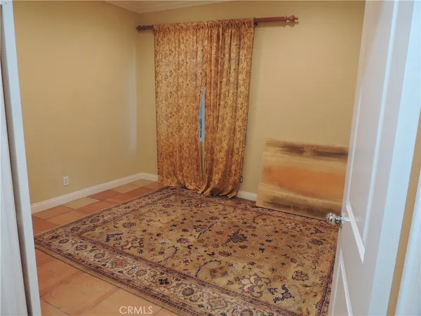 a view of a door with wooden floor