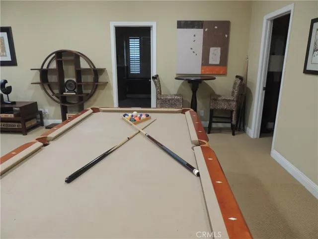 a view of a livingroom with furniture and front door