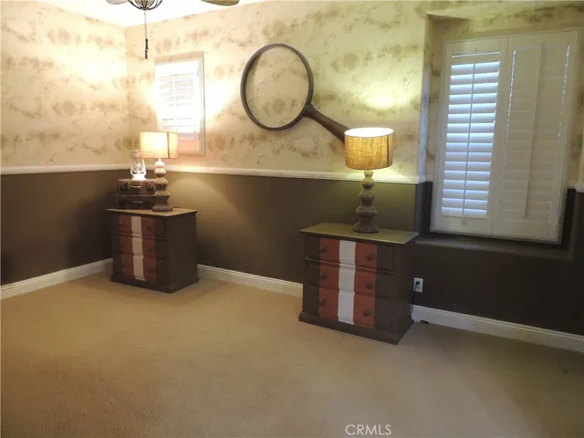 a room with a table and a mirror