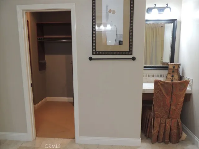 a view of cabinet and mirror