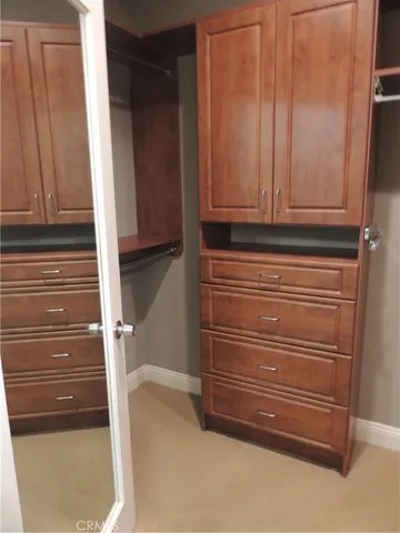 a bathroom with a double vanity sink and mirror
