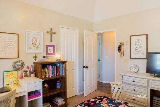 308 North Nolan Street Ridgecrest, CA 93555 - Photo 23 of 35 a view of walk in closet with clothes and shoes