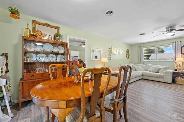 a view of a dining room with furniture