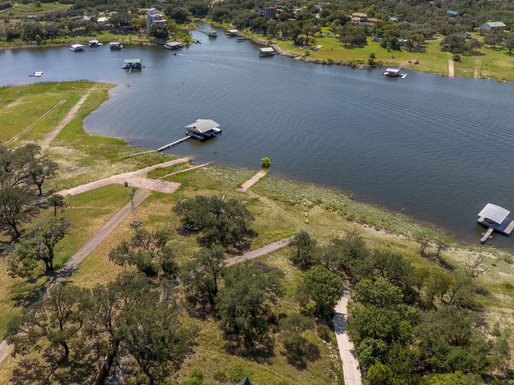 19625 Lakehurst Loop Spicewood, TX 78669 - Photo 14 of 25 an aerial view of residential houses with outdoor space