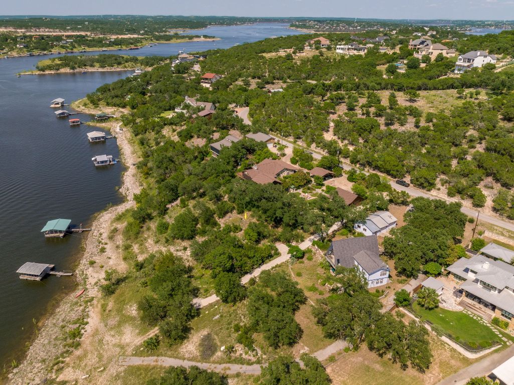 19625 Lakehurst Loop Spicewood, TX 78669 - Photo 16 of 25 an aerial view of residential houses with outdoor space