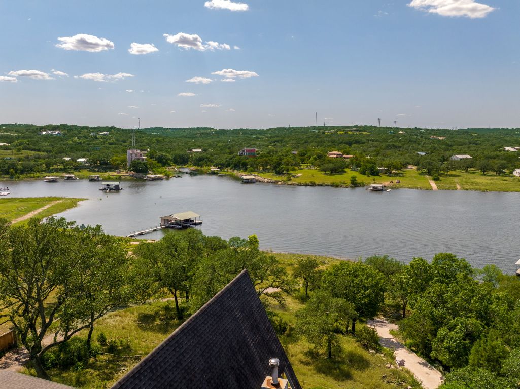 19625 Lakehurst Loop Spicewood, TX 78669 - Photo 8 of 25 a view of a lake with a city