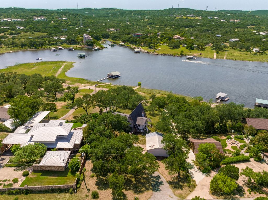 19625 Lakehurst Loop Spicewood, TX 78669 - Photo 9 of 25 an aerial view of residential houses with outdoor space and river