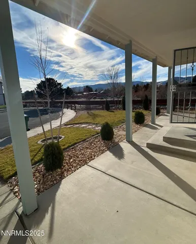 a view of a balcony with lake view and a floor to ceiling window
