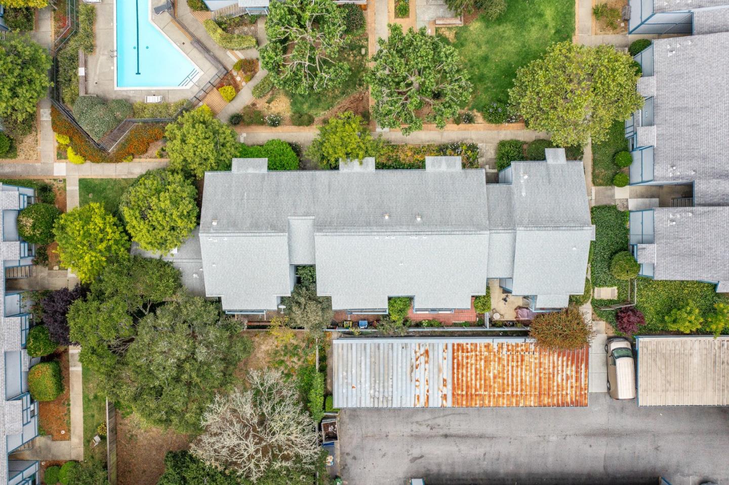 1925 46th Avenue, Unit 78 Capitola, CA 95010 - Photo 27 of 31 an aerial view of a house with a yard and large trees