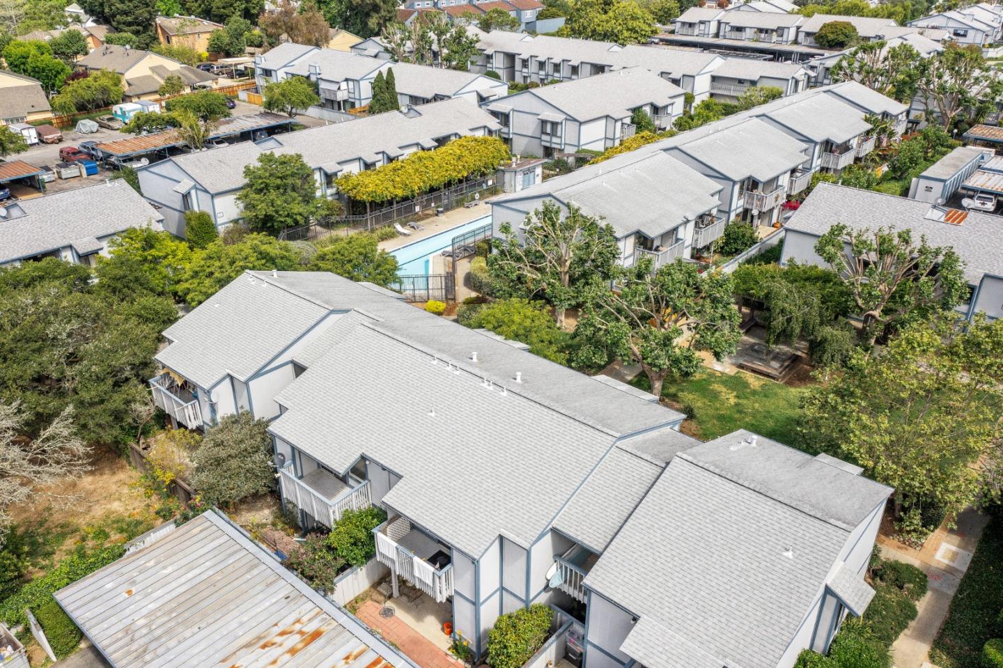 1925 46th Avenue, Unit 78 Capitola, CA 95010 - Photo 29 of 31 an aerial view of a house with a yard and lake view