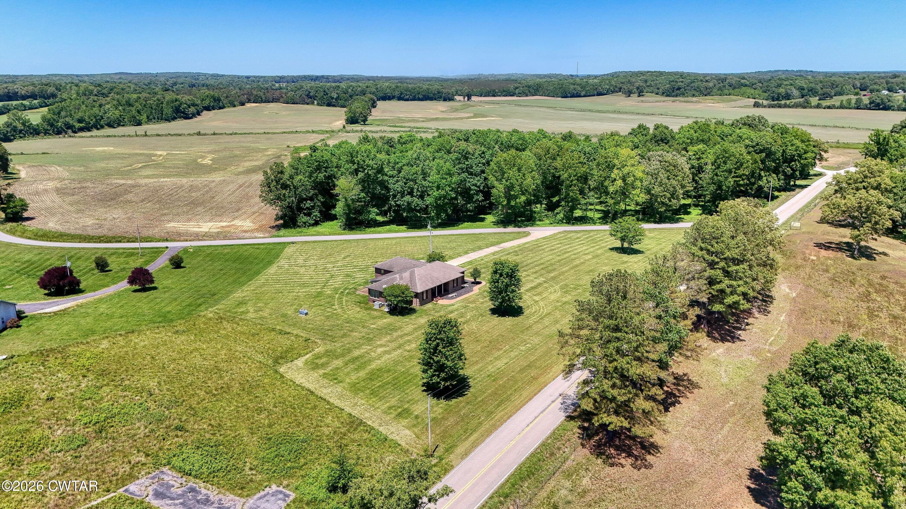 75 Crum Road Yuma, TN 38390 - Photo 7 of 39 DJI_20260508132019_0087_D