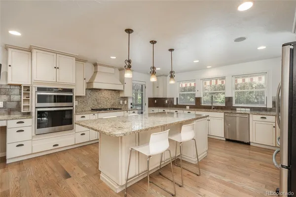 a bathroom with a shower and a sink