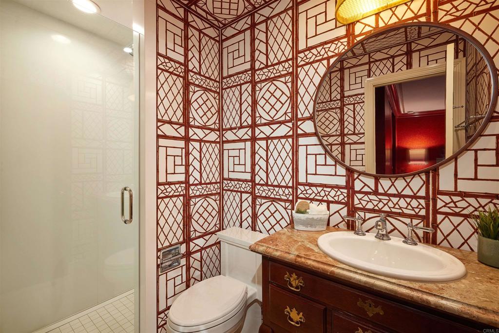 219 Calle De Sereno Encinitas, CA 92024 - Photo 29 of 43 a bathroom with a sink a toilet and shower